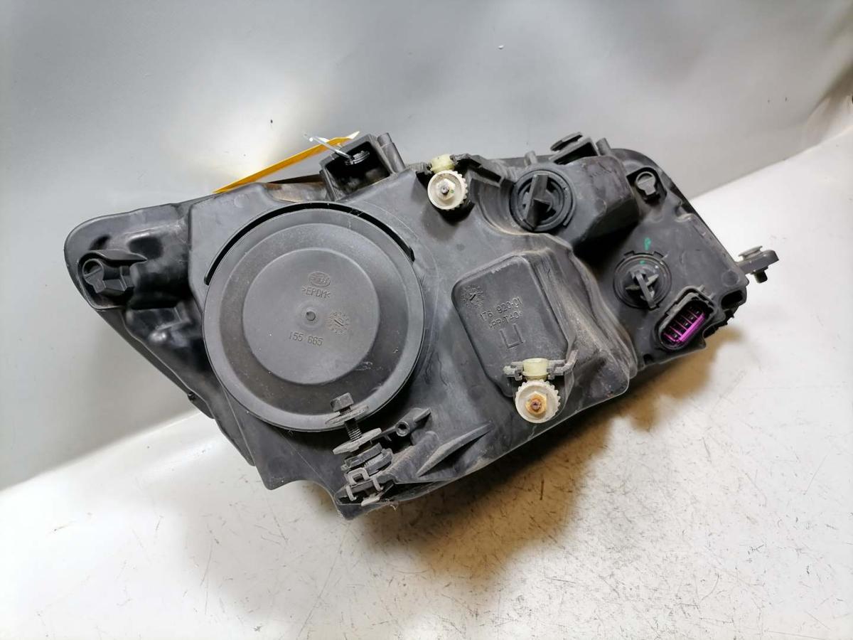 VW Caddy 3 2K original Scheinwerfer vorn links Halogen Facelift Bj.2011